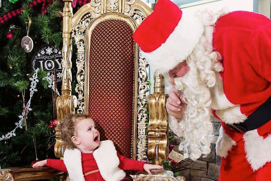 10 Hilarious Photos of Baby Meeting Santa